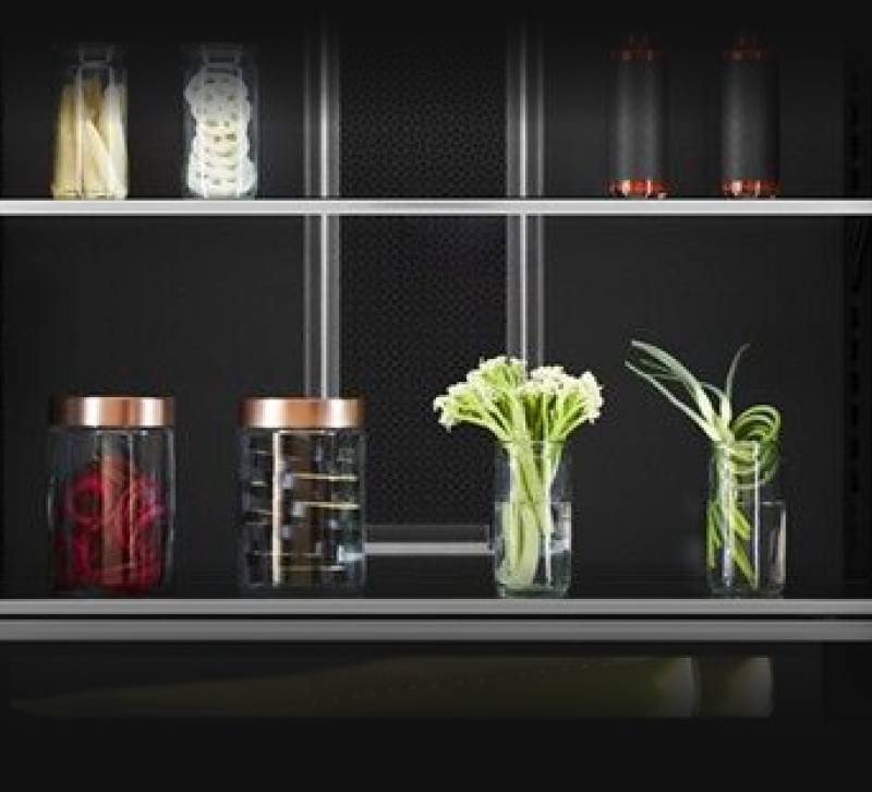 Fine ingredients on the glass and metal shelves inside of a Column.