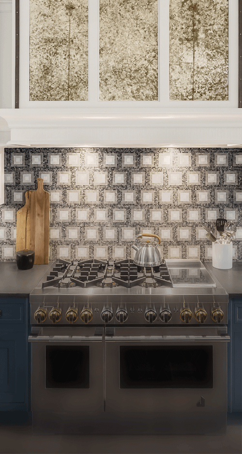 A RISE™ Professional-Style Range in a blue kitchen.  A RISE™ Professional-Style Range in a blue kitchen.