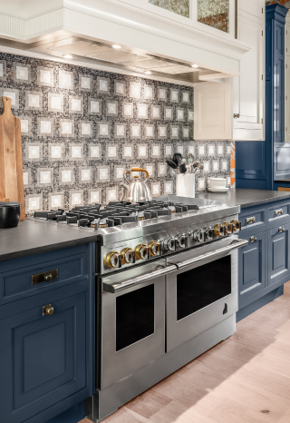 A JennAir® RISE™ Professional-Style Range in the kitchen. A JennAir® RISE™ Professional-Style Range in the kitchen.