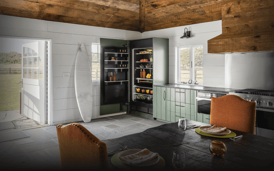 A NOIR™ Professional-Style Range in a blue kitchen.  A NOIR™ Professional-Style Range in a blue kitchen.