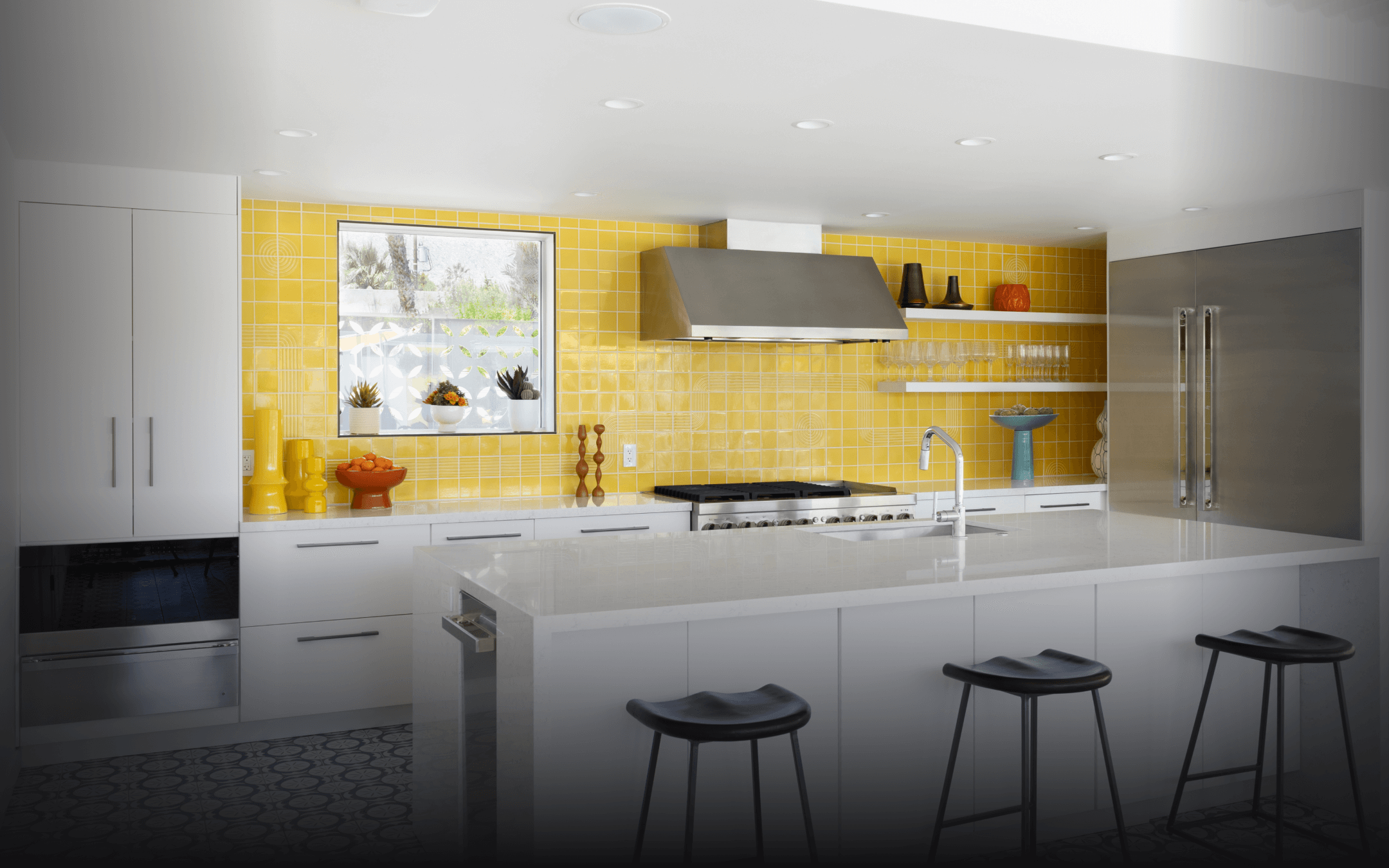 A JennAir® Professional-Style Range in a yellow kitchen. A JennAir® Professional-Style Range in a yellow kitchen.