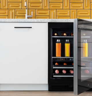 A whole-kitchen view featuring a pair of open JennAir® Columns with an Obsidian Interior. A whole-kitchen view featuring a pair of open JennAir® Columns with an Obsidian Interior.