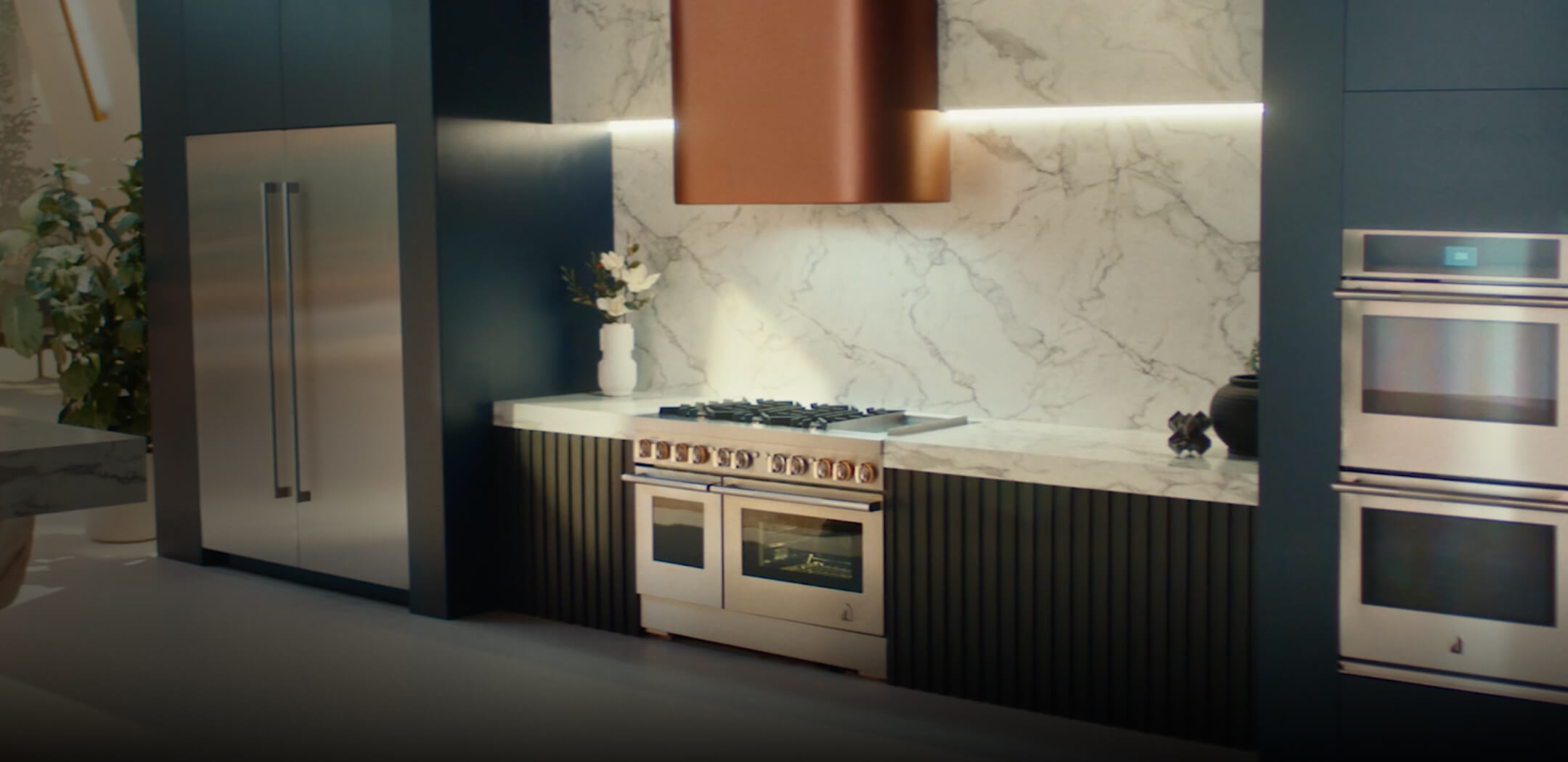 A luxury kitchen filled with JennAir® appliances.