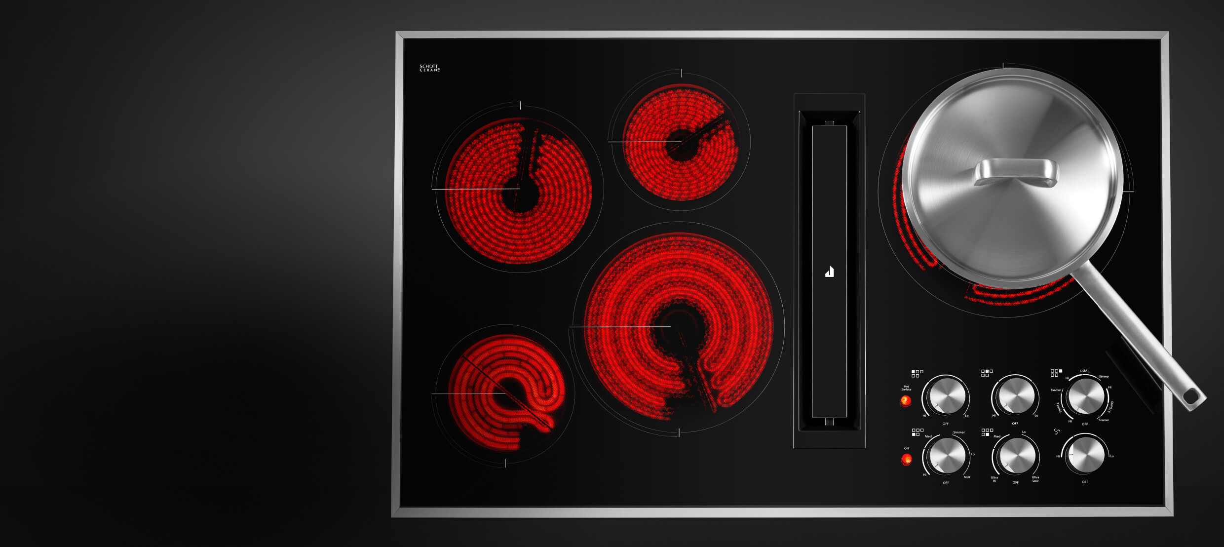 Top-down view of an electric radiant cooktop with the elements glowing red. Top-down view of an electric radiant cooktop with the elements glowing red.