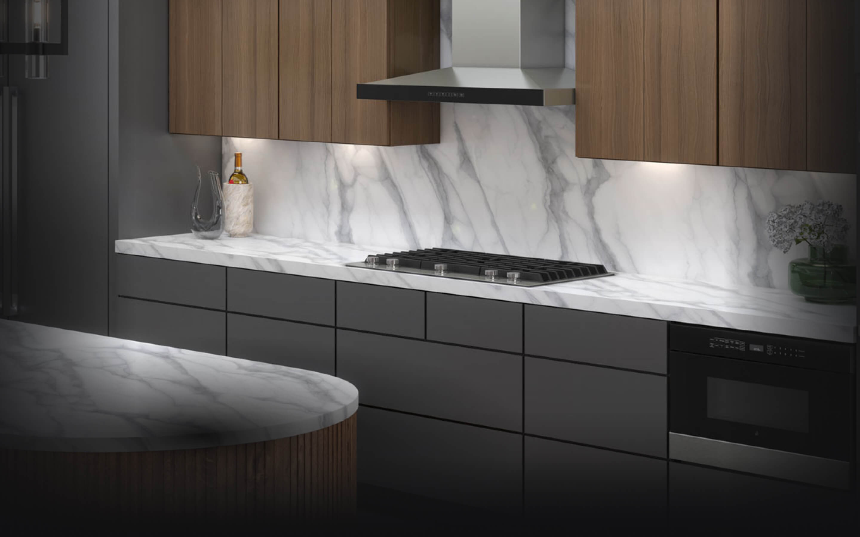 A JennAir® Gas Cooktop in a contemporary kitchen. A JennAir® Gas Cooktop in a contemporary kitchen.