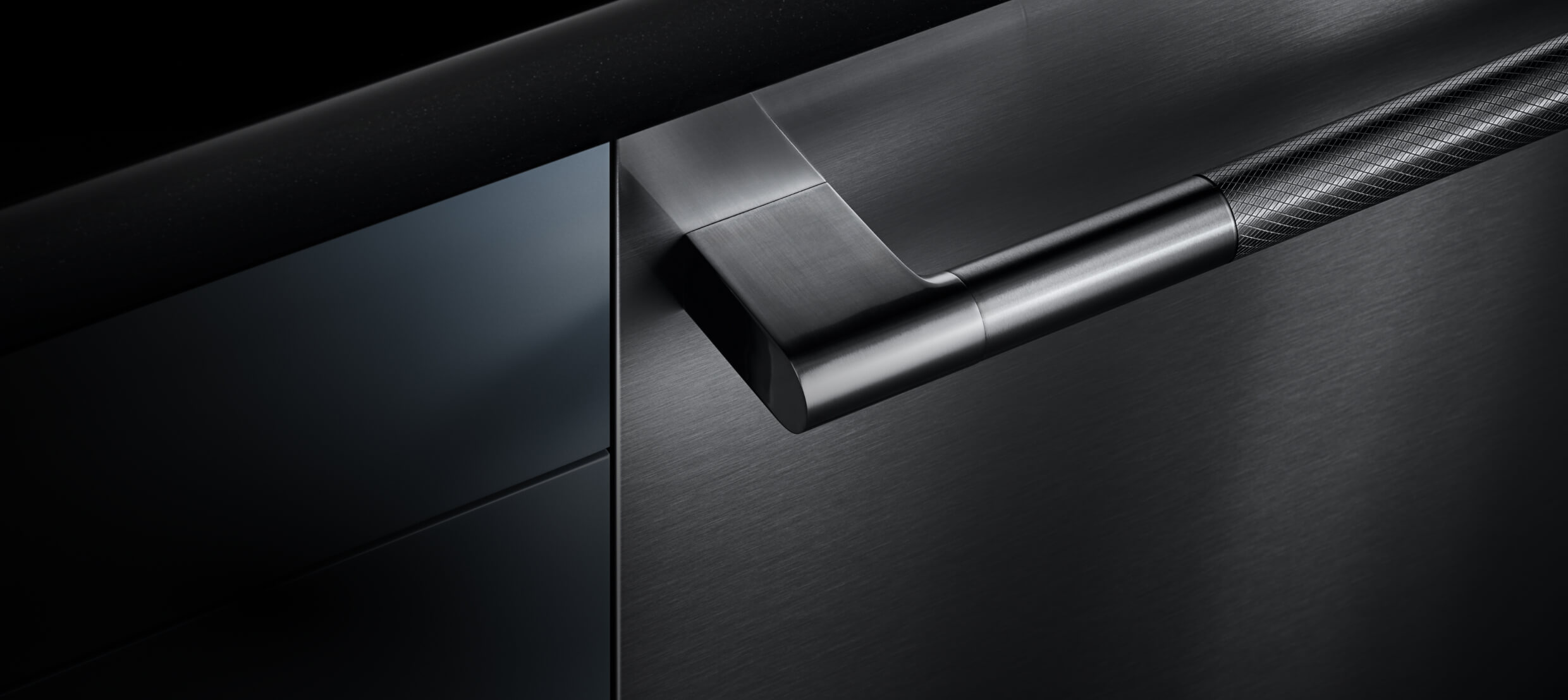 A dishwasher front and handle installed into a cabinet, showing off the fully flush design. A dishwasher front and handle installed into a cabinet, showing off the fully flush design.