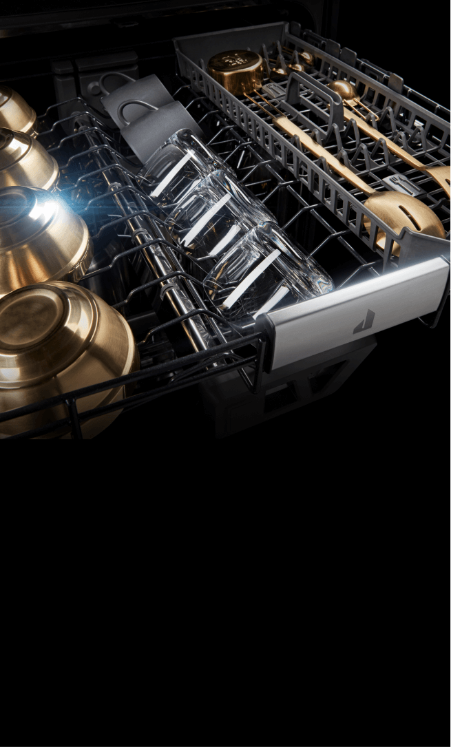 Dry, gleaming dishes in the 3rd rack of a dishwasher. Dry, gleaming dishes in the 3rd rack of a dishwasher.