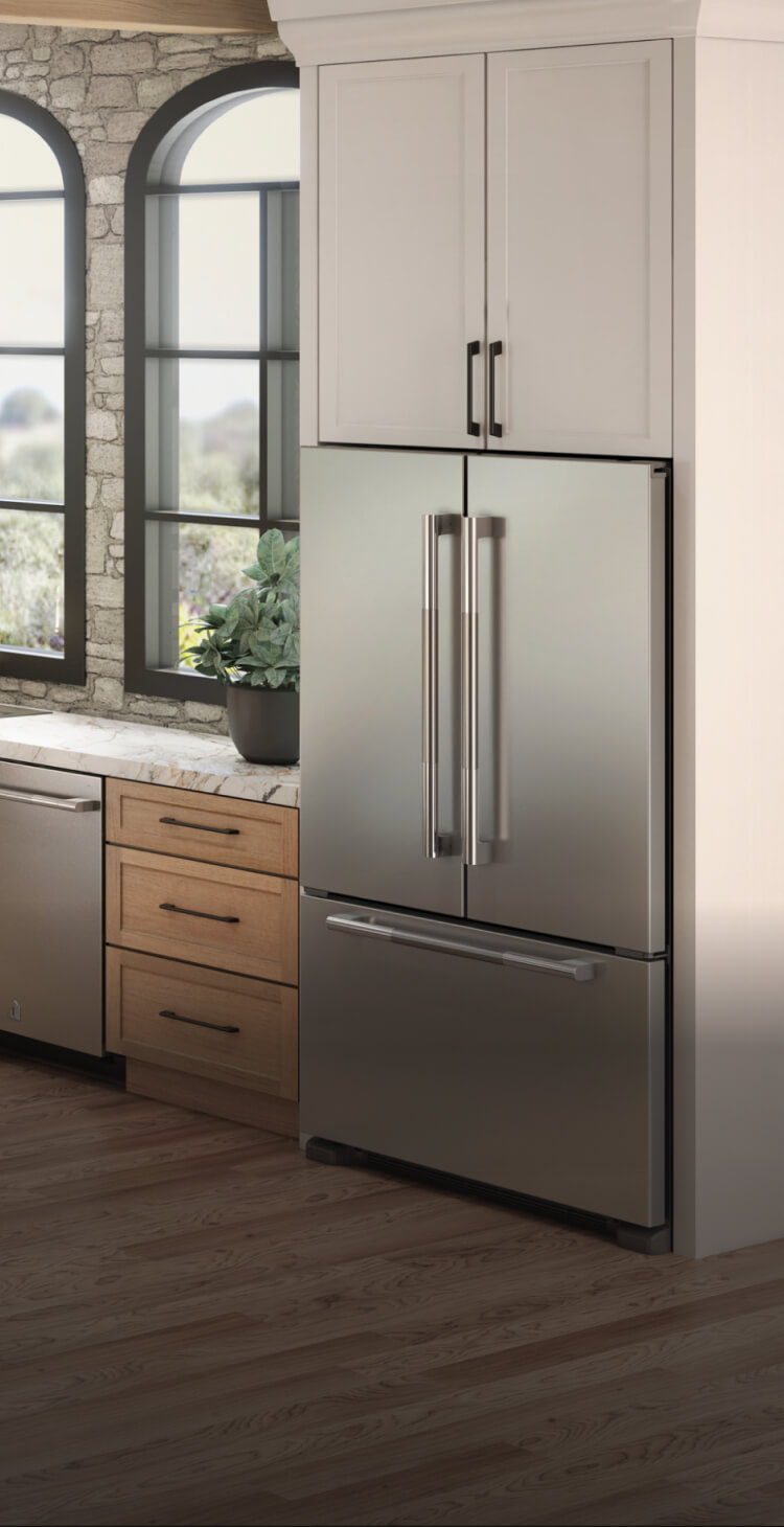 A kitchen featuring JennAir® appliances and a French Door Freestanding Refrigerator. A kitchen featuring JennAir® appliances and a French Door Freestanding Refrigerator.