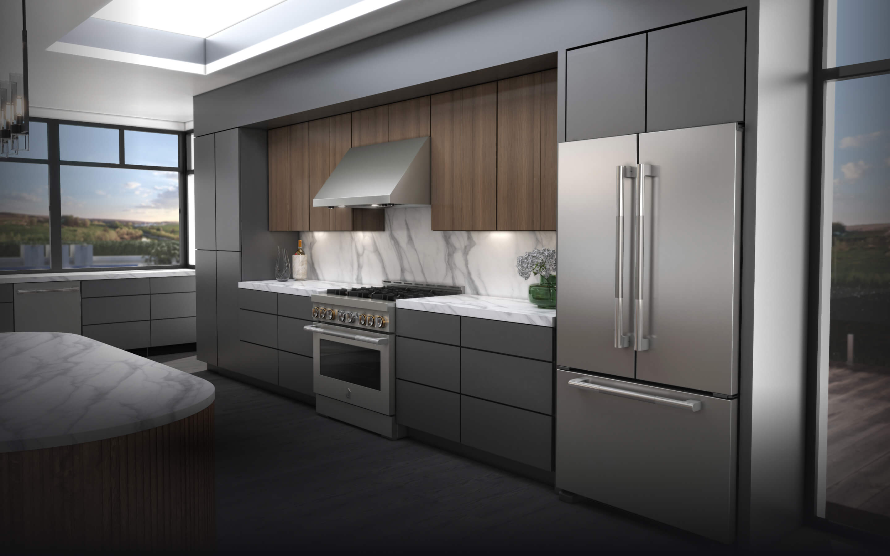 A kitchen featuring JennAir® appliances and a French Door Freestanding Refrigerator. A kitchen featuring JennAir® appliances and a French Door Freestanding Refrigerator.