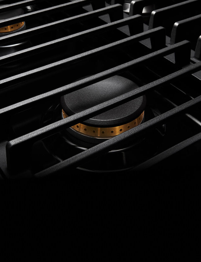 The grates on a JennAir® NOIR™ Rangetop. The grates on a JennAir® NOIR™ Rangetop.