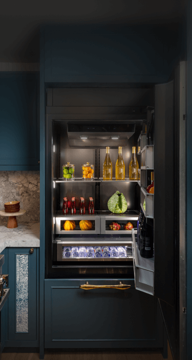 A real kitchen featuring a JennAir® Bottom-Mount Built-In Refrigerator. A real kitchen featuring a JennAir® Bottom-Mount Built-In Refrigerator.