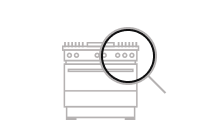 An icon of a range with a magnifying glass over it.