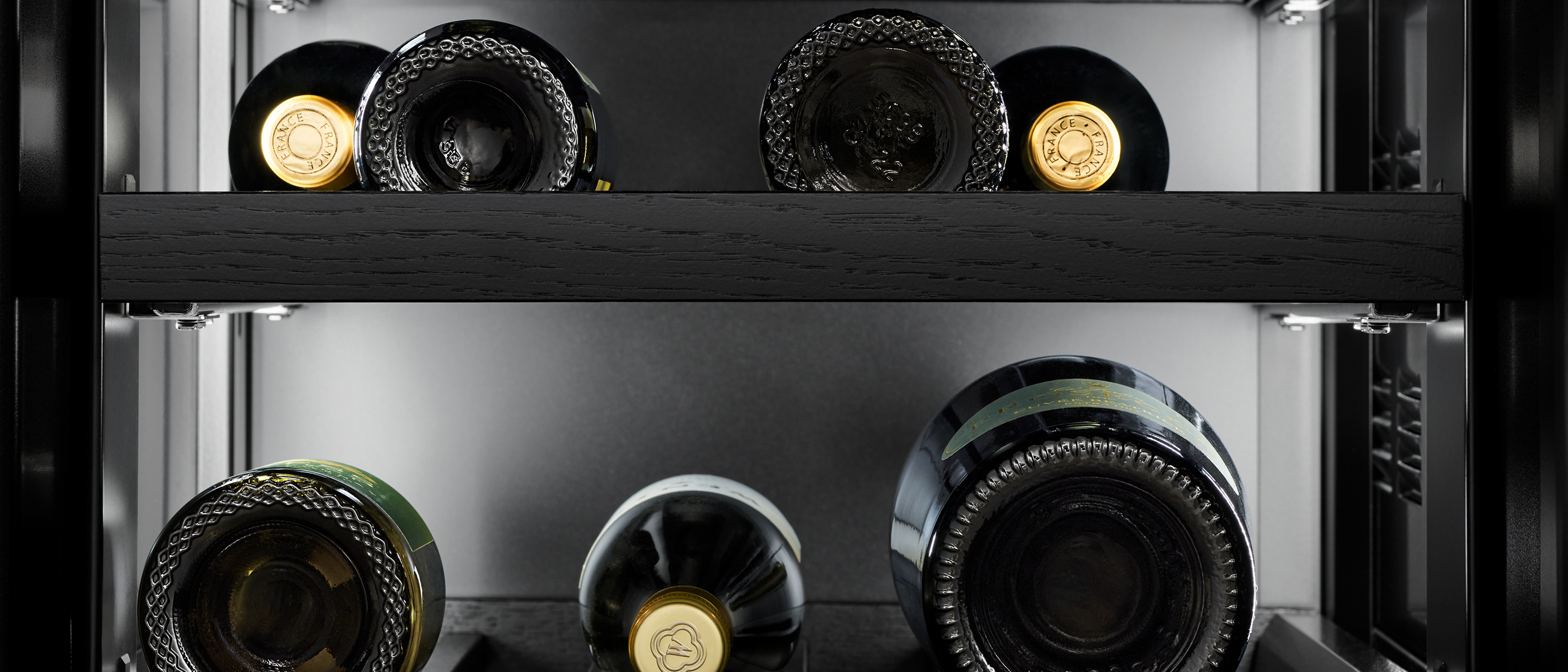 The interior of the wine column, showing bottles. The interior of the wine column, showing bottles.