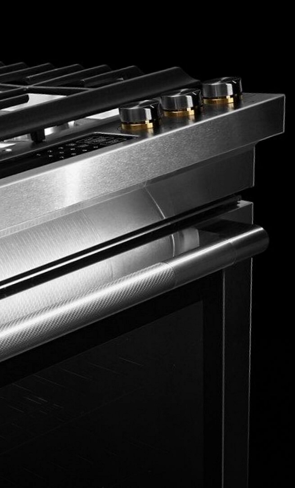 The sleek, stainless steel finish on a slide-in range.