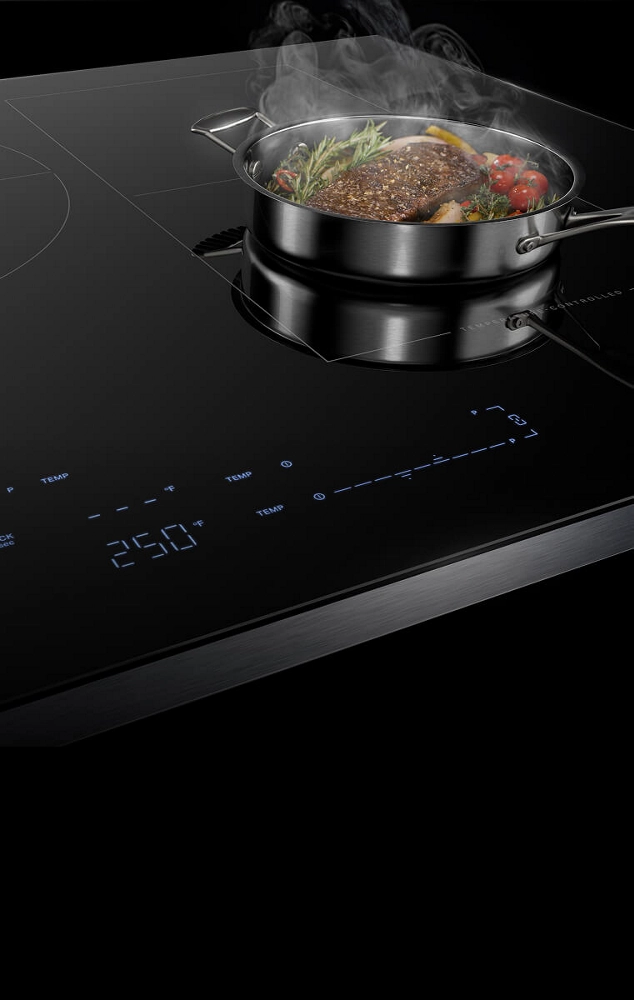 A steaming pan on an induction cooktop.