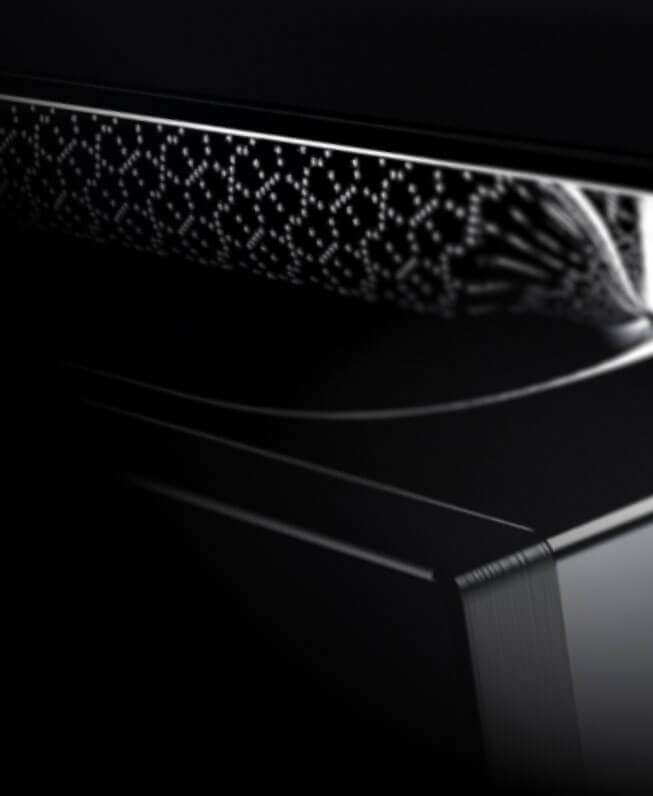 A close up view of the NOIR™ handle's lace handle in a reflection.