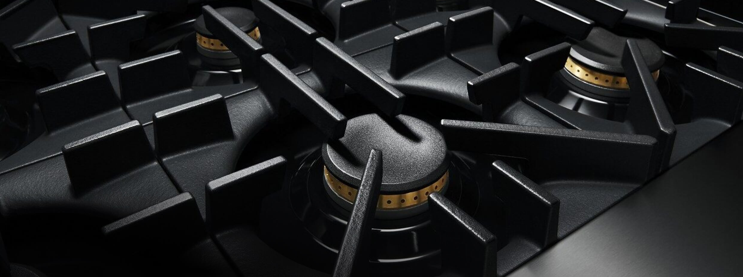 A close up of the geometric grates of a RISE™ Range.