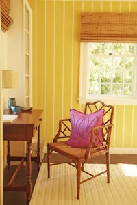 A chair and desk in the Yellow Bedroom. 