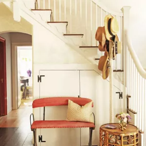 The red bench and decor in the Garden Foyer. 